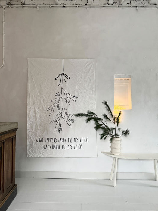 What happens under the mistletoe