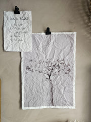 Sfeerbeeld house rules en gedroogde bloem.